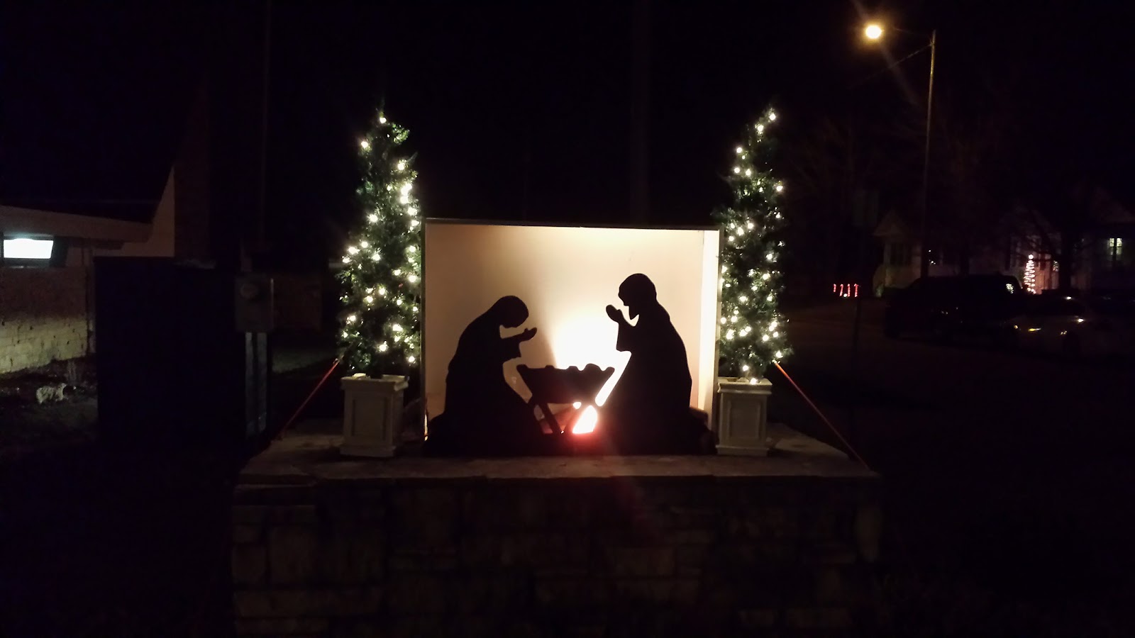 Outdoor nativity display at night from the First Landmark Missionary Baptist Google listing