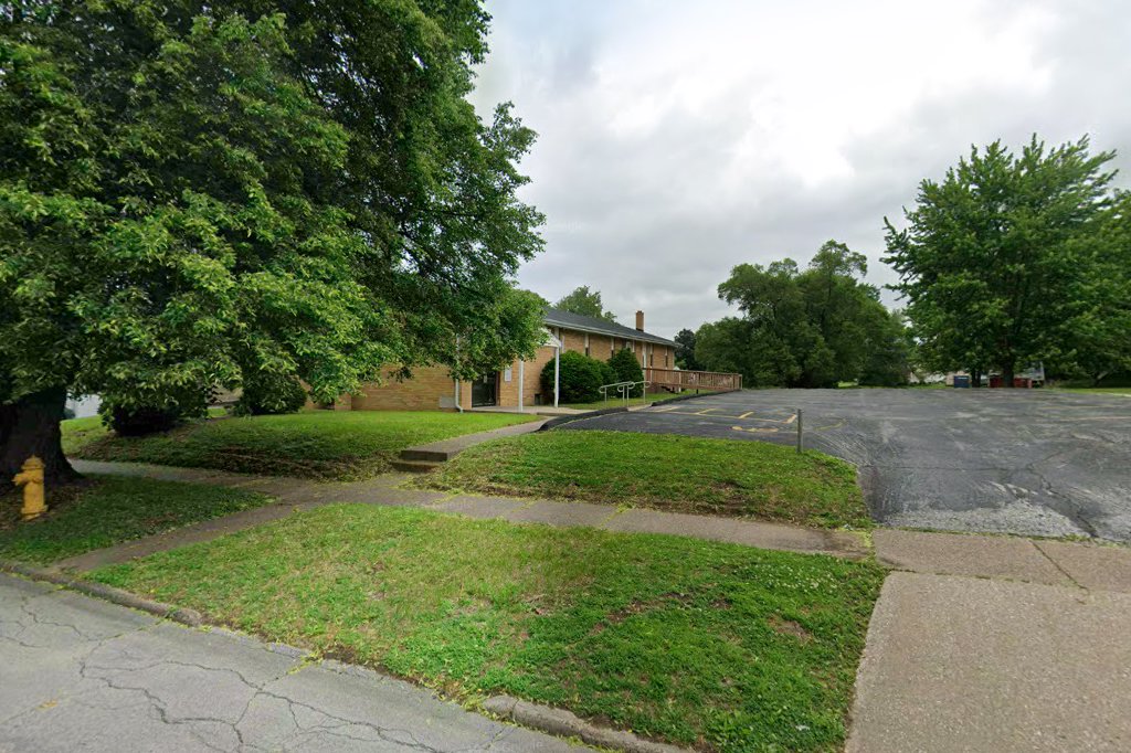 Street view of the brick building and parking area at the First Landmark Missionary Baptist location on 29th Avenue
